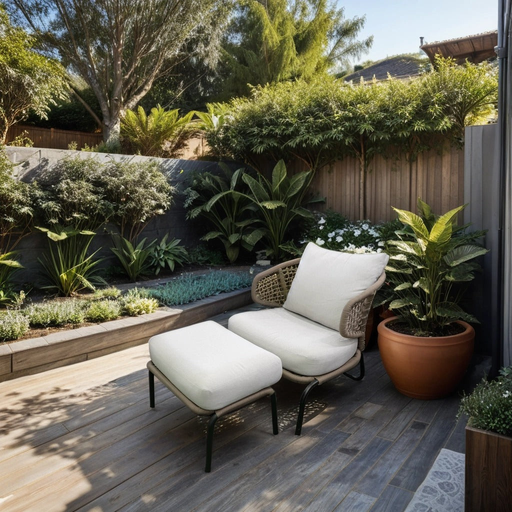 Grey armchair with footrest